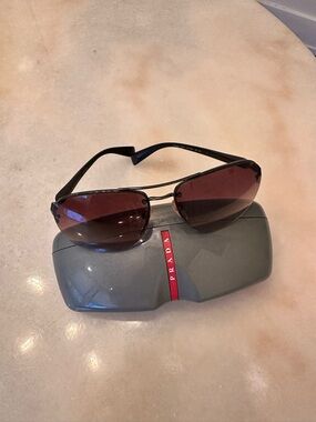 Prada Black Eyewear with Brown Lenses